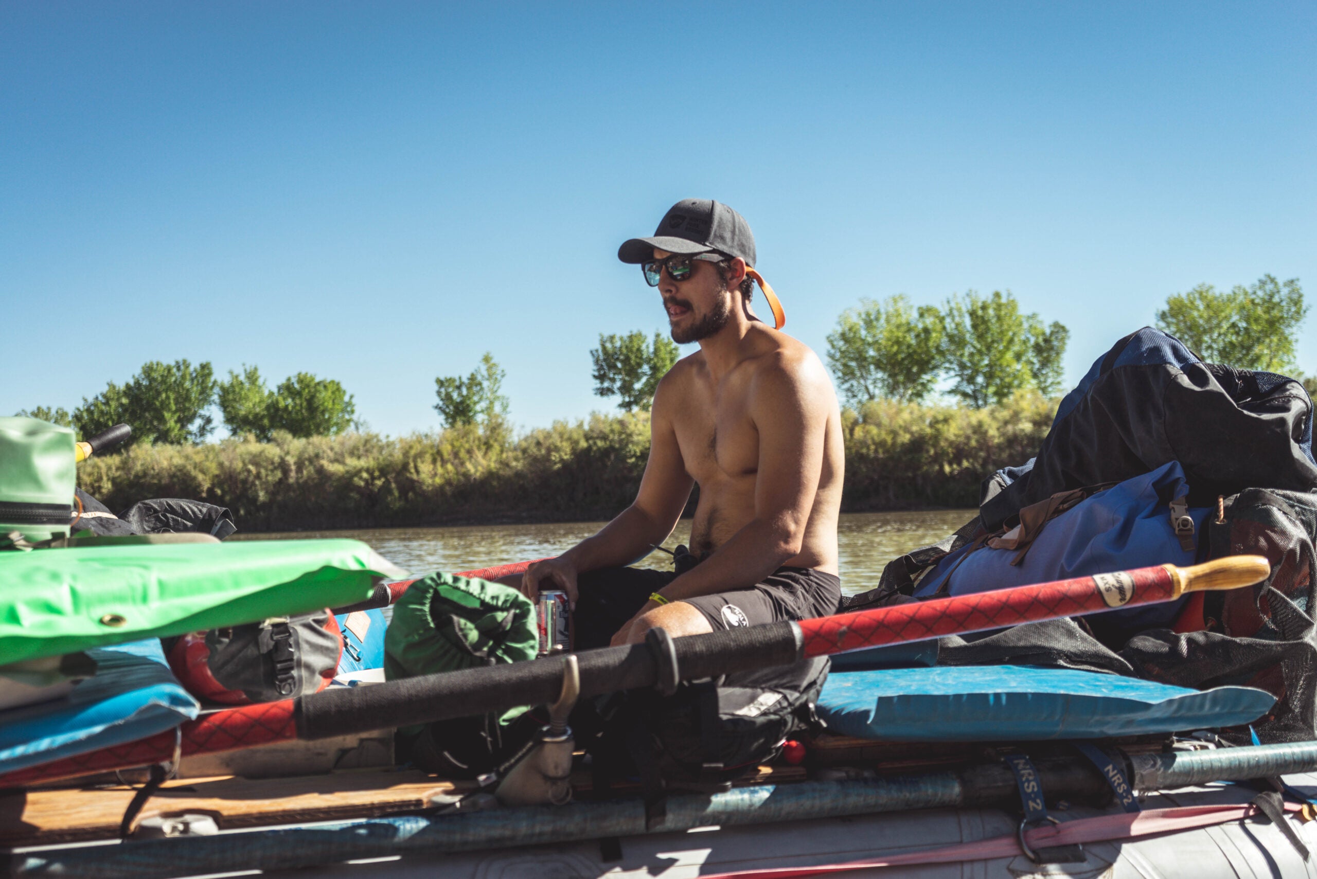 Man River Raft Boat Oars Shirtless