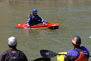 Teaching your friends to paddle....so they don't quit in their first season!