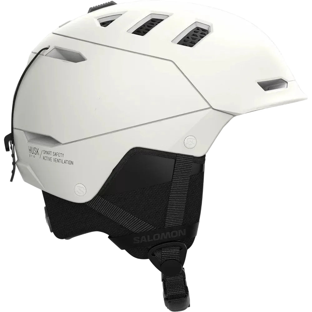 White helmet with black straps on a white background