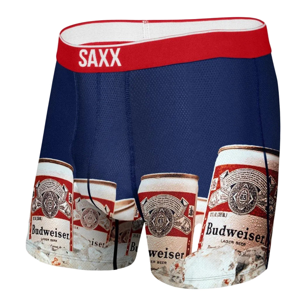 A pair of Saxx Volt boxer briefs with a blue and red color scheme, featuring a printed pattern with the Budweiser brand.