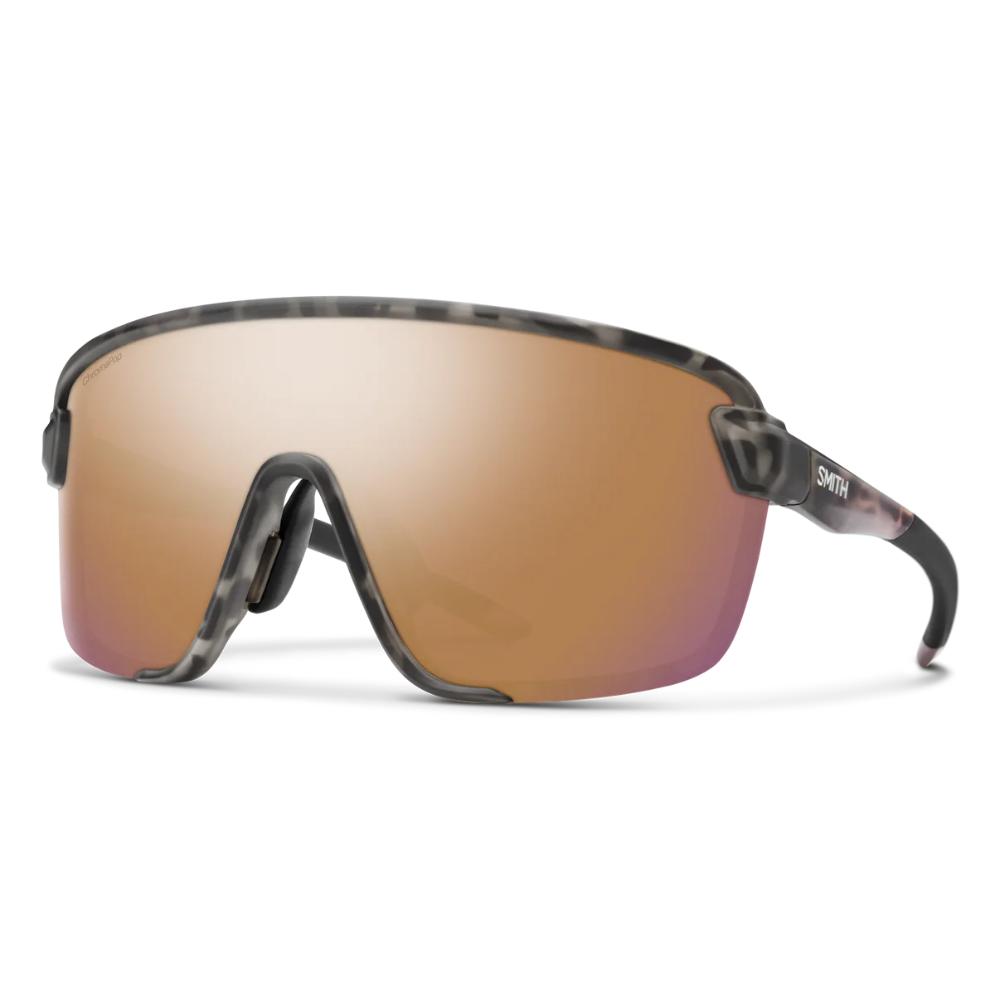 Sunglasses with brown lenses and black frame on a white background