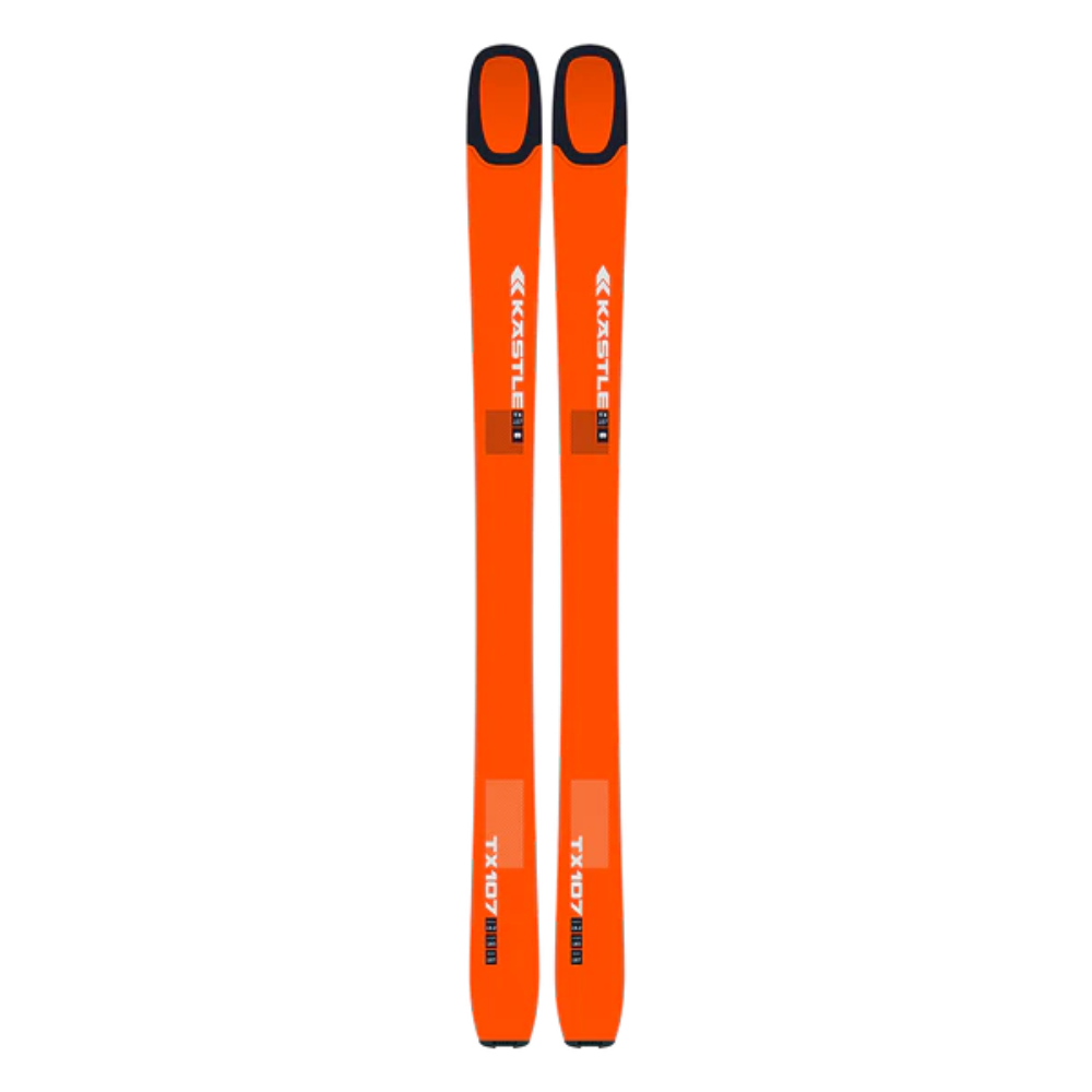 Orange skis with black bindings on a white background