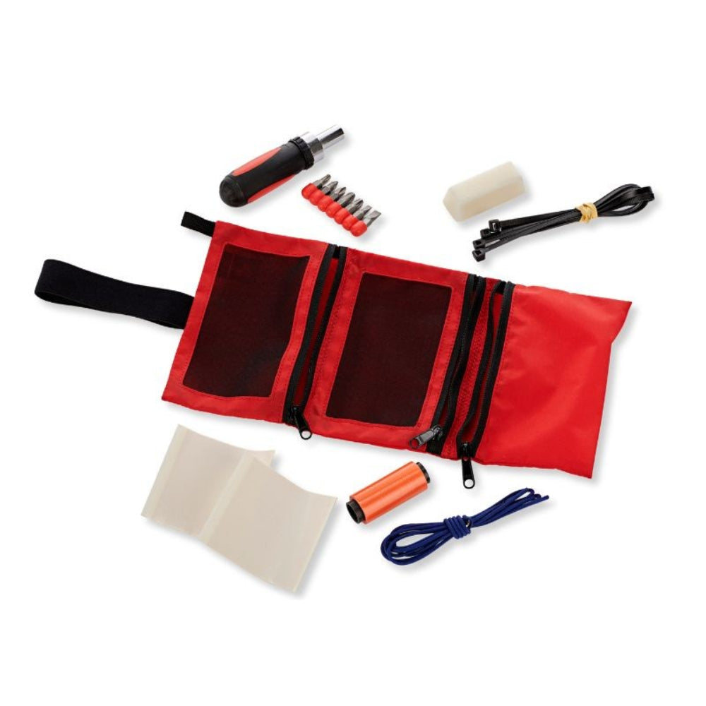 Red tool roll with various tools on a white background