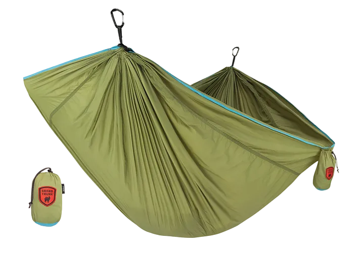 Green hammock with carrying bag on a white background