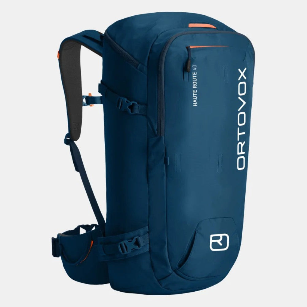 Blue backpack with Ortovox branding on a light gray background