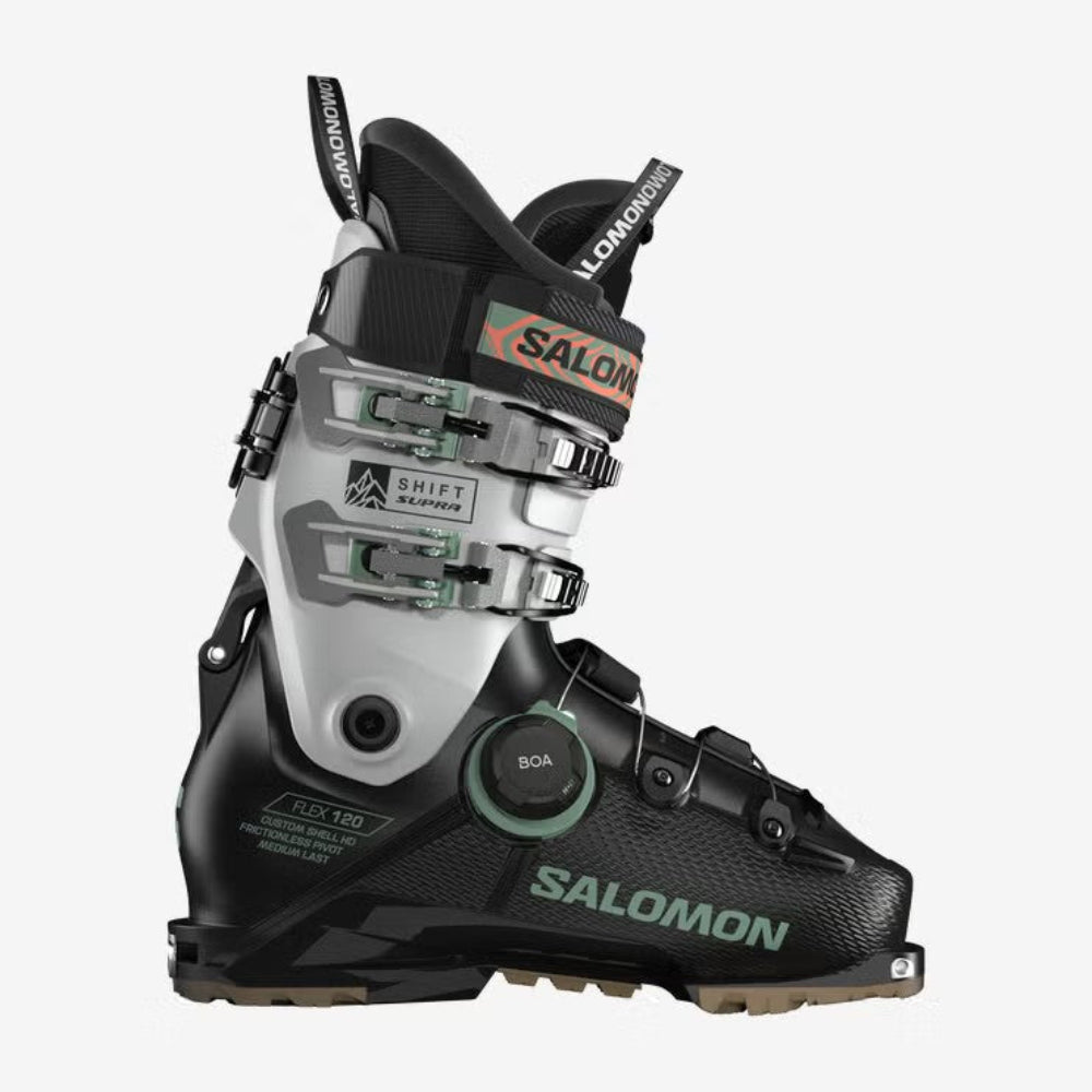 Black Salomon ski boot on a white background